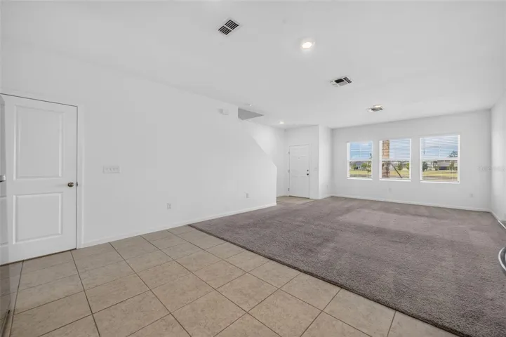 Living room and front door entry