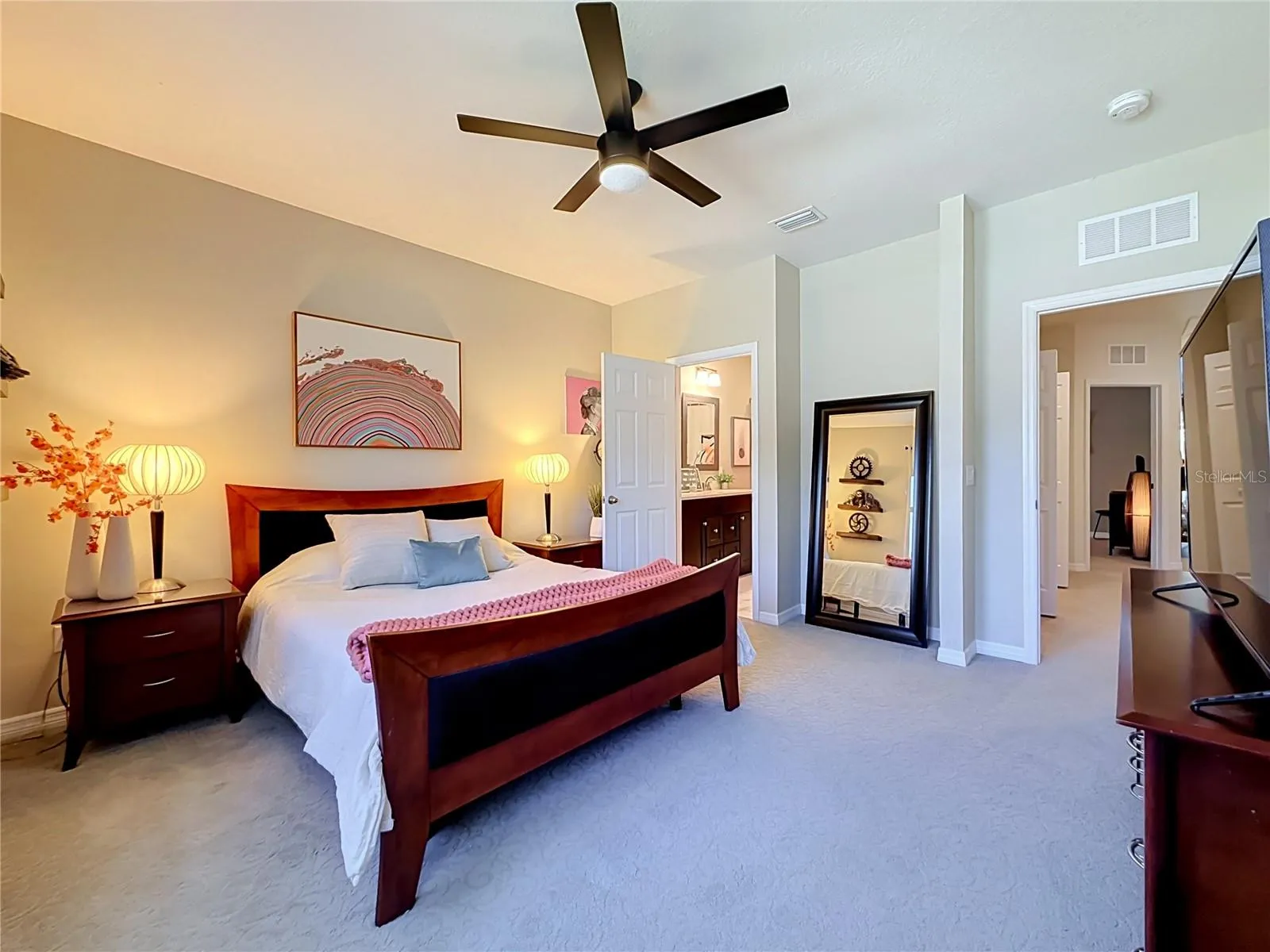 Primary Suite features an en-suite bath and WALK-IN CLOSET
