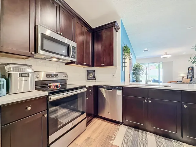 The seamless flow between the kitchen, living, and dining areas makes entertaining a breeze.