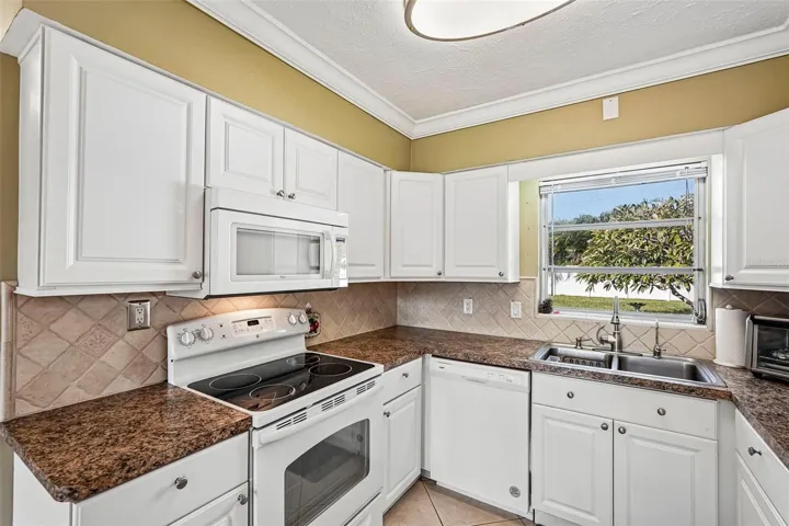 309 Kitchen overlooking large, private rear yard