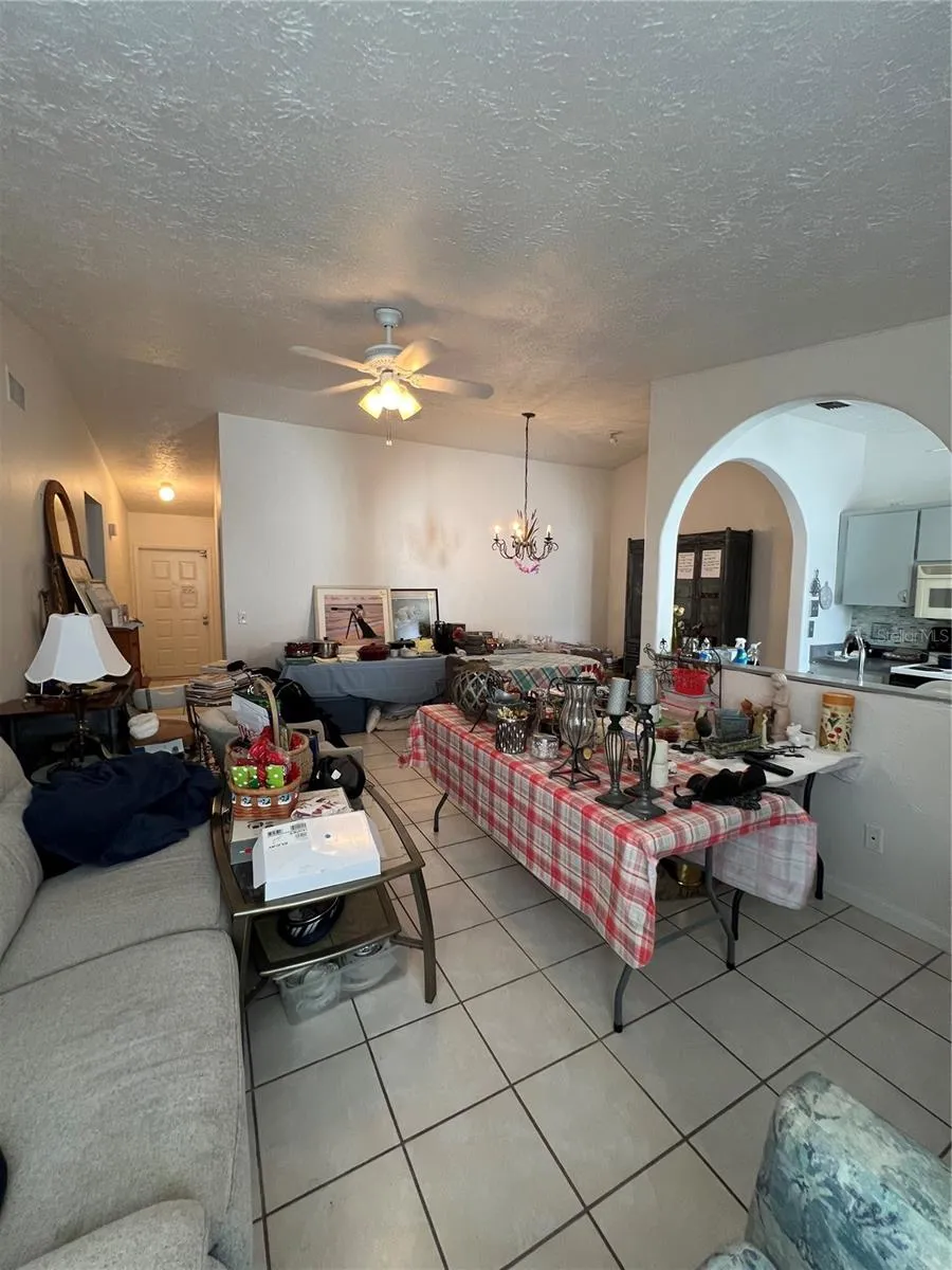 View of living room, dining room and entry.