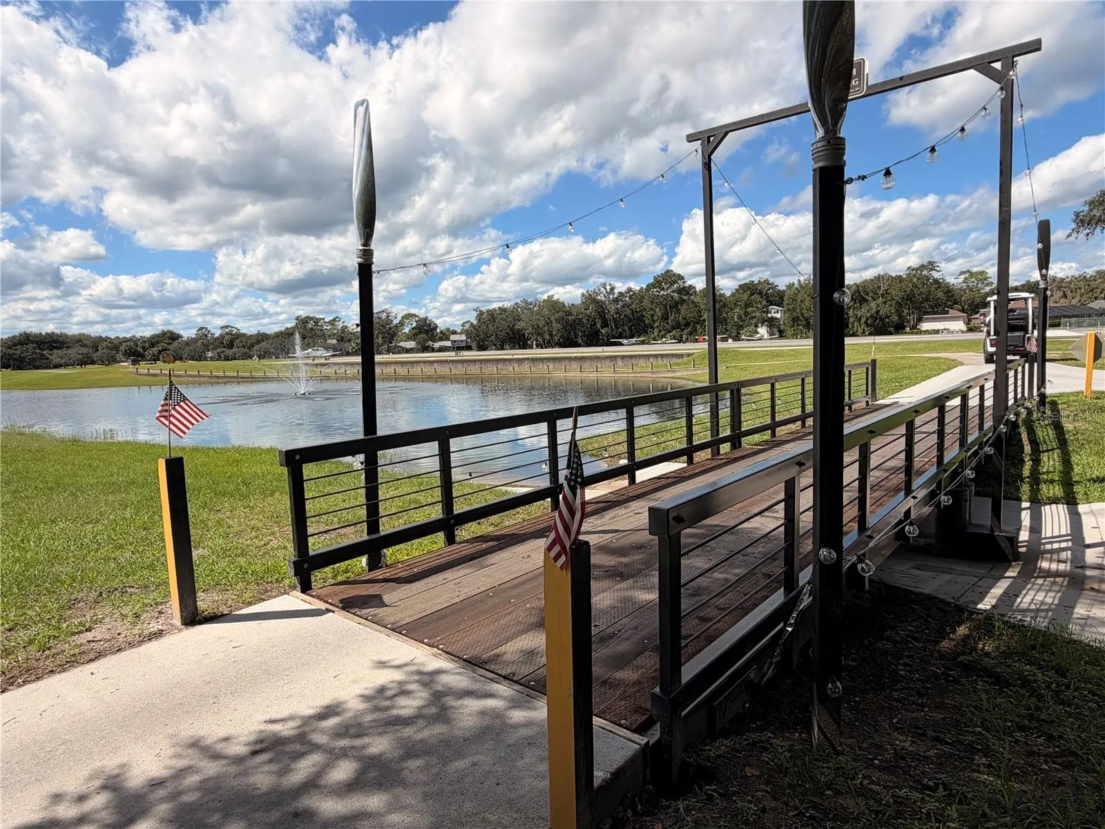 Golf cart bridge, lakes and fountains, a runway, and a golf course... all in your backyard!