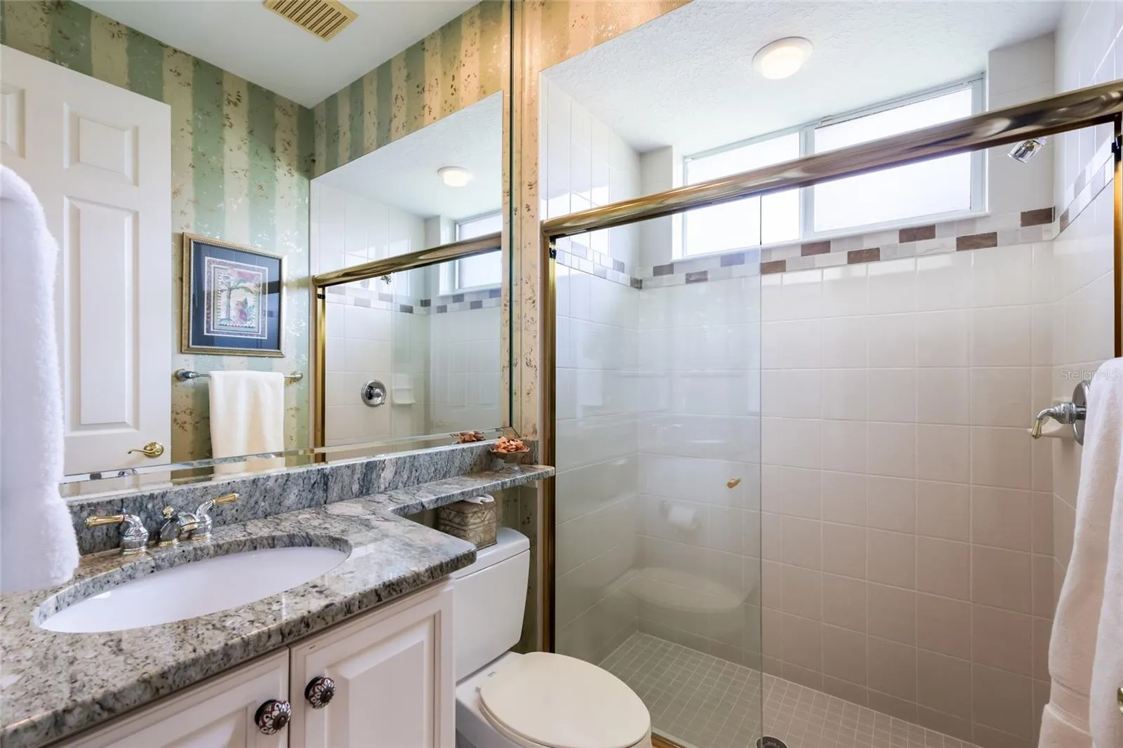 Guest bath adjacent to bedroom 2