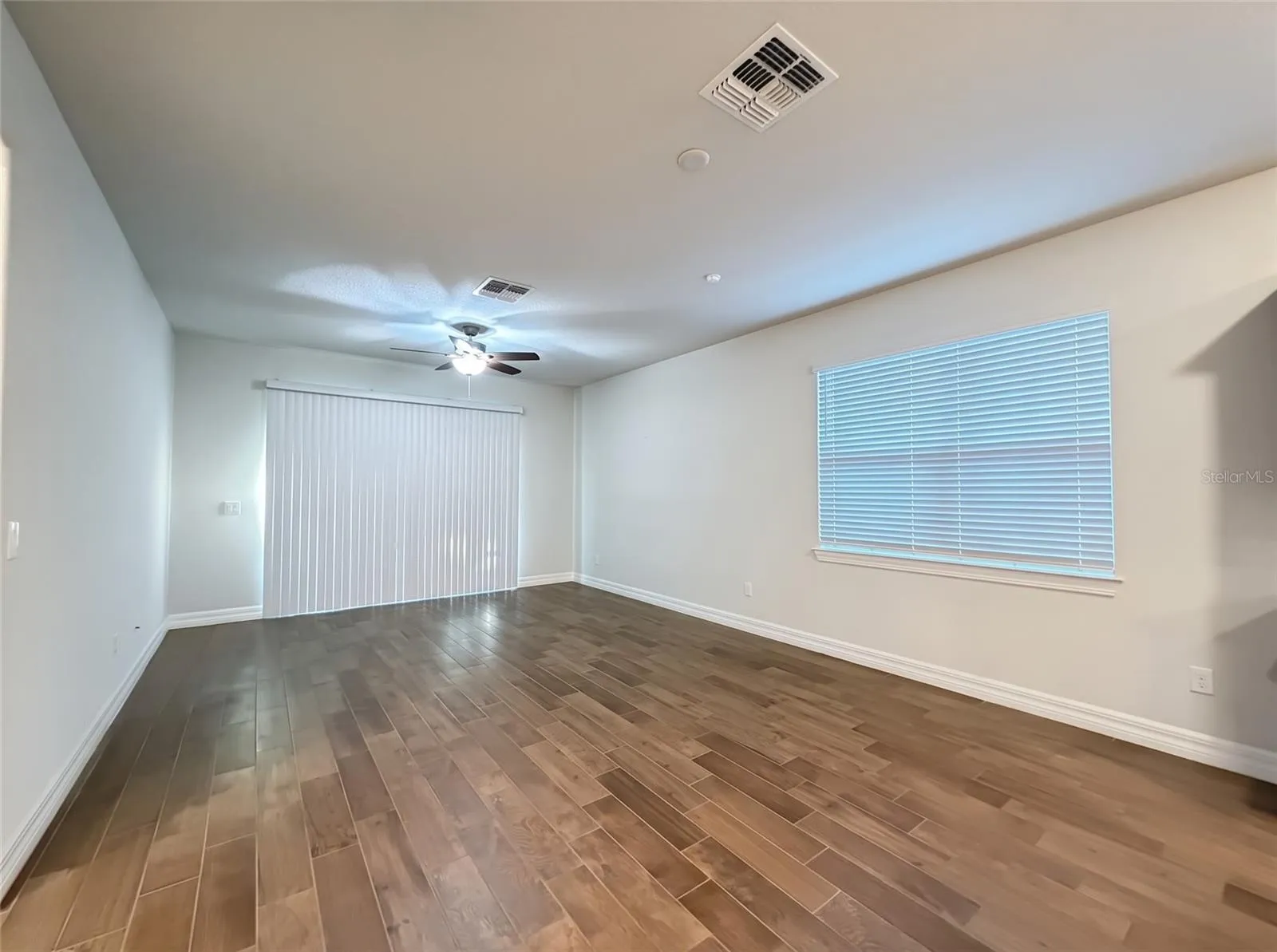 Living Room with Sliders to Screened Porch