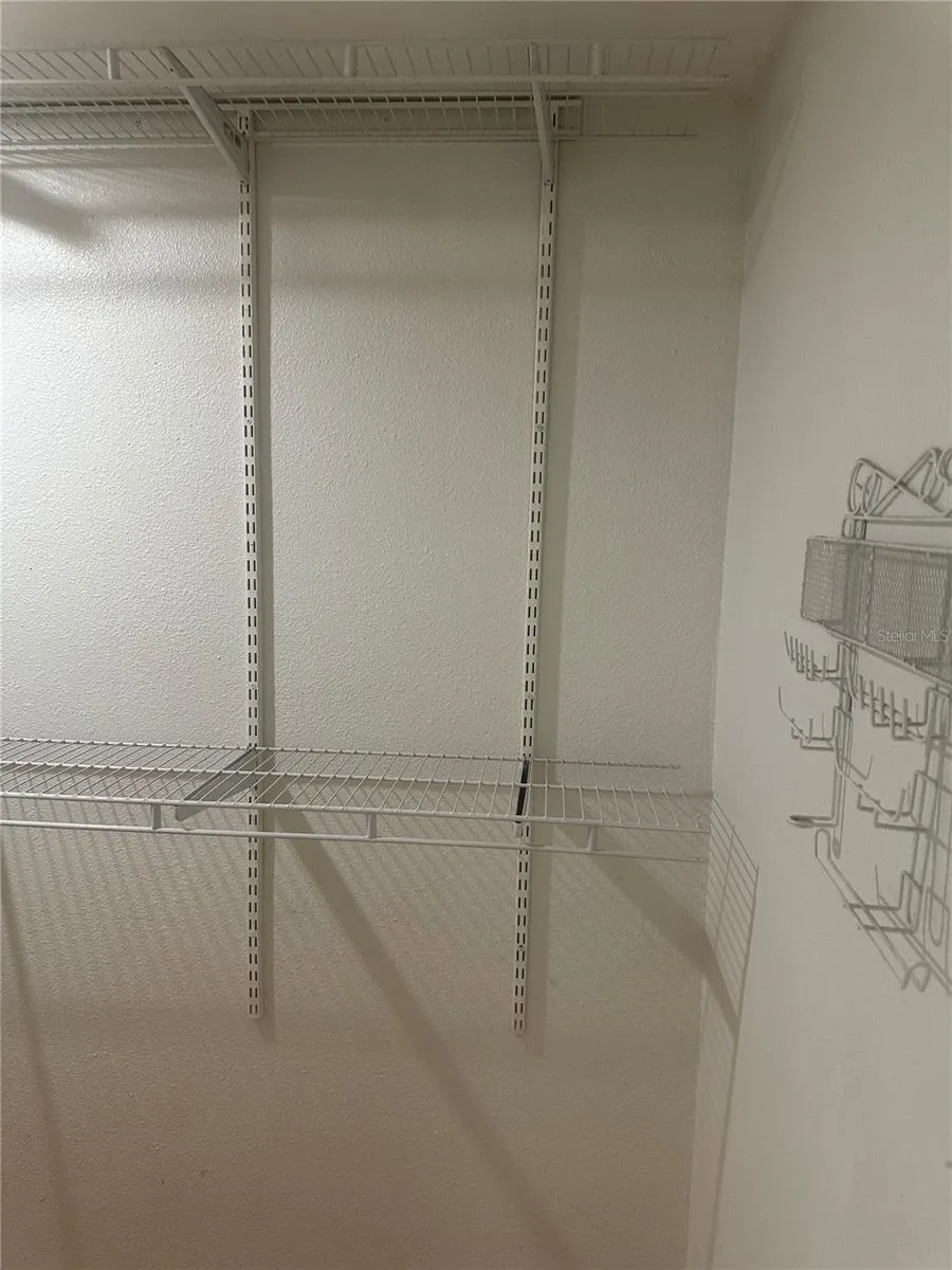 PRIMARY WALK IN CLOSET