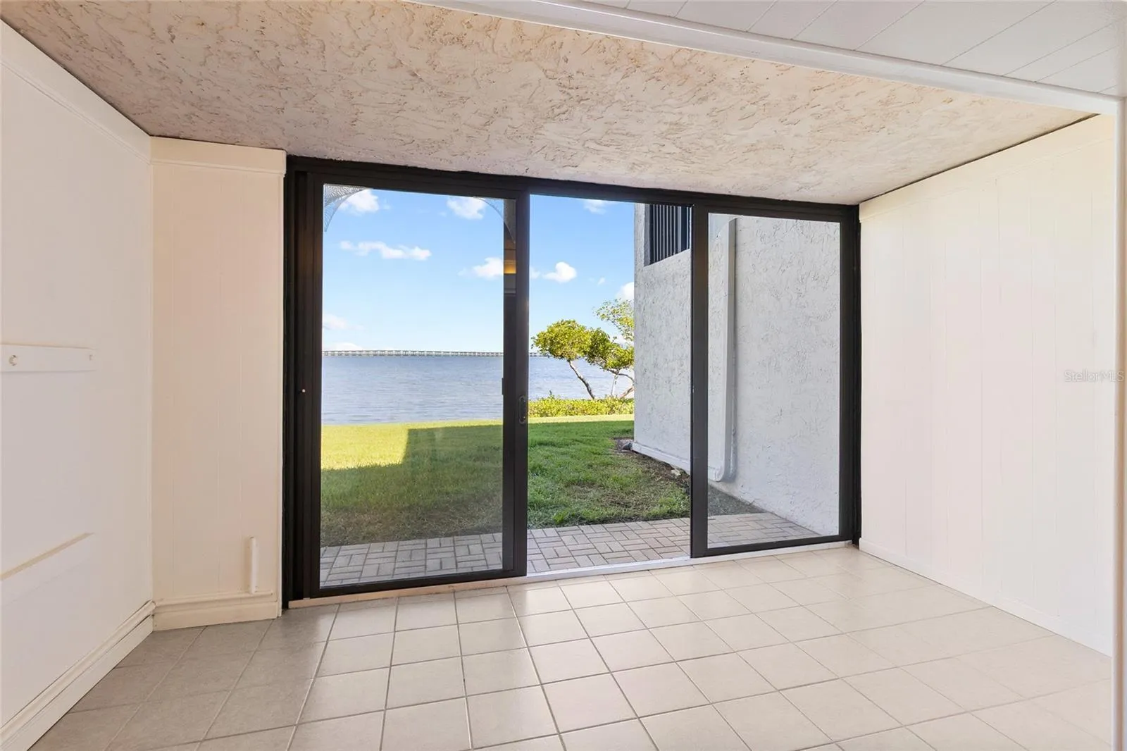 Sunroom directly off Living area - full water view.