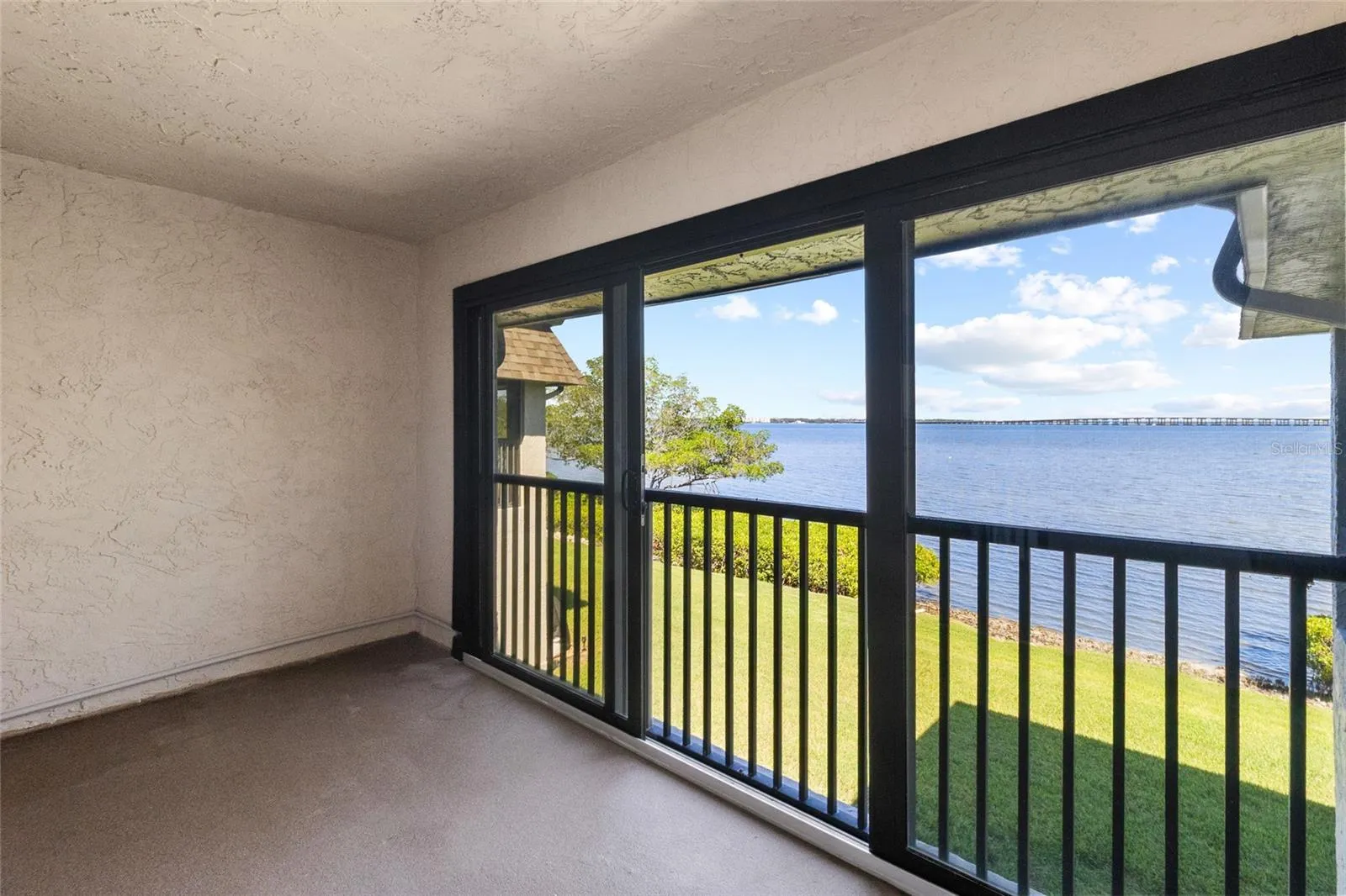 Balcony off primary bedroom - full panoramic water views