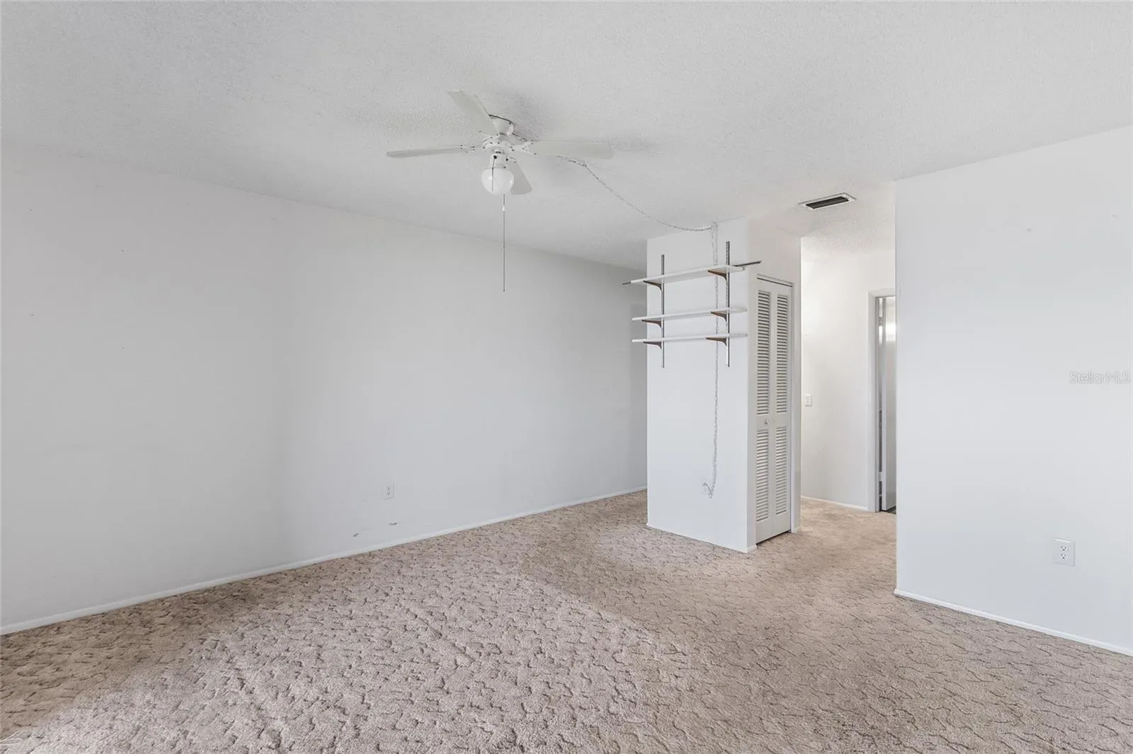 Primary suite looking toward closets and ensuite bath