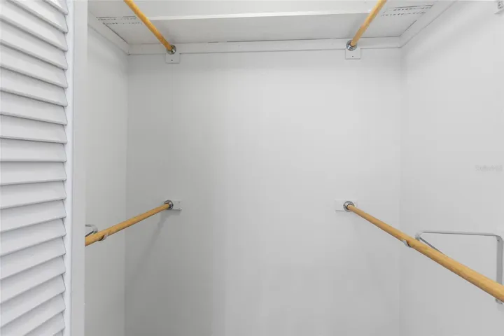 Spacious walk in closet in primary suite