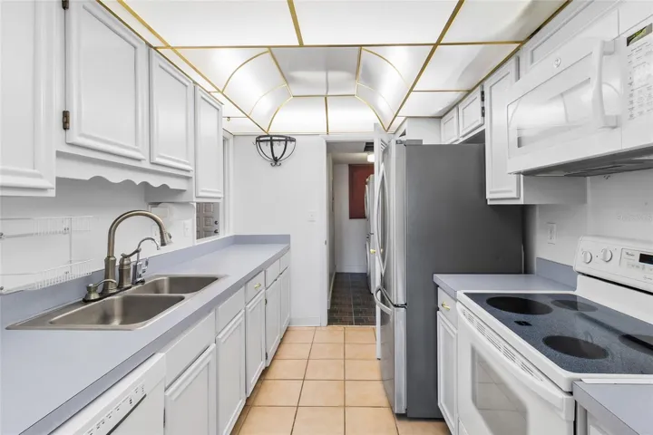 Kitchen looking toward interior laundry room
