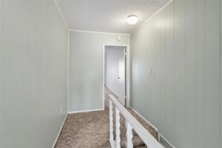 Stairway looking toward primary suite