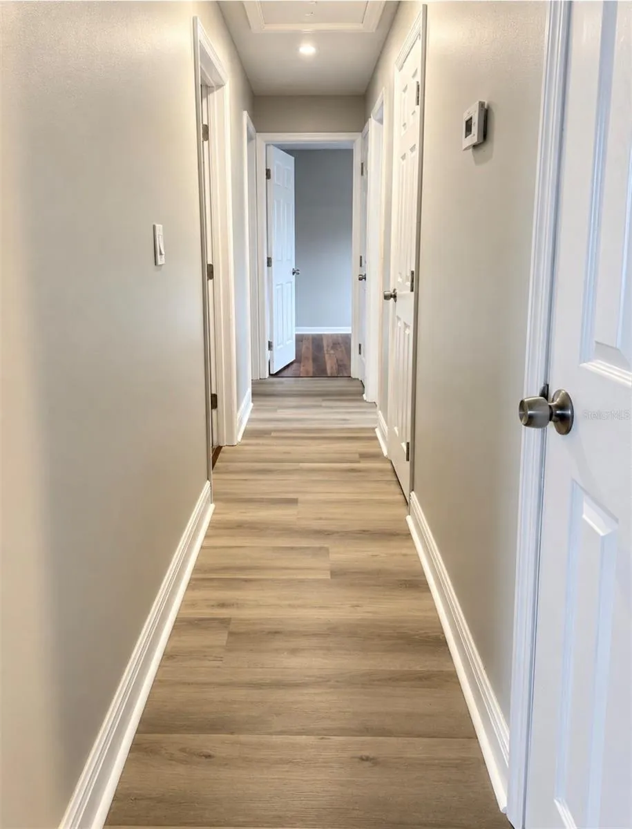 Hallway to rooms and bathrom