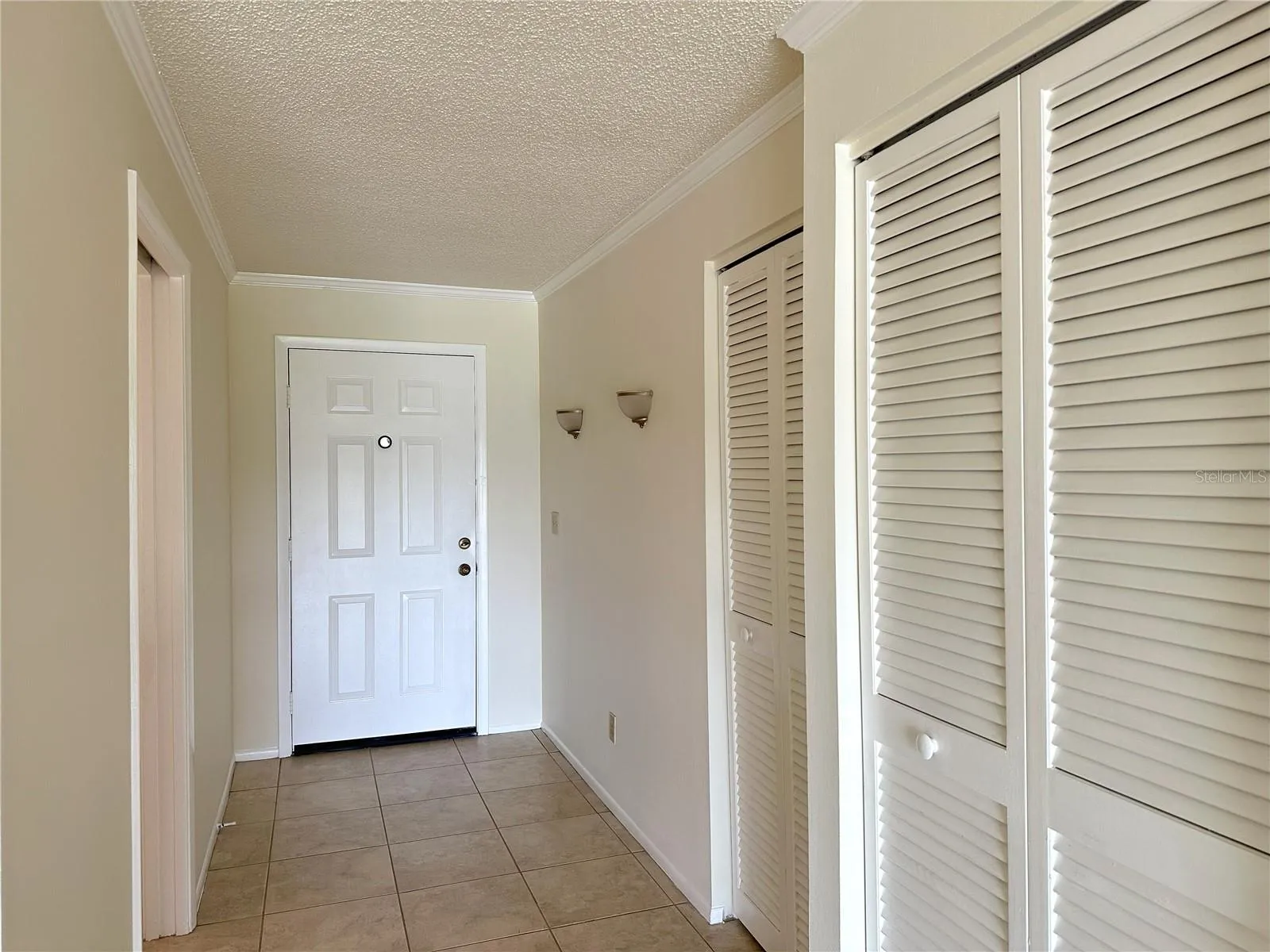 Entry with hall closet
