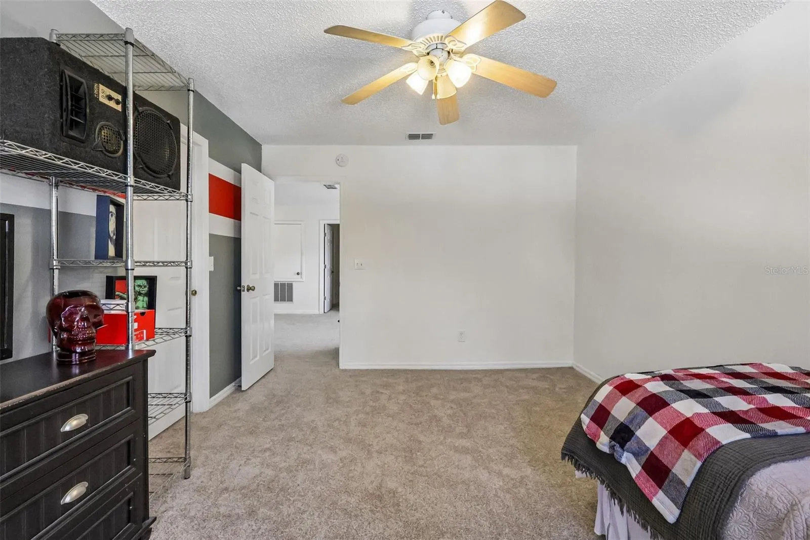 2 of 4 total bedrooms upstairs -- one at each corner of the house. This one has a LARGE WIC.