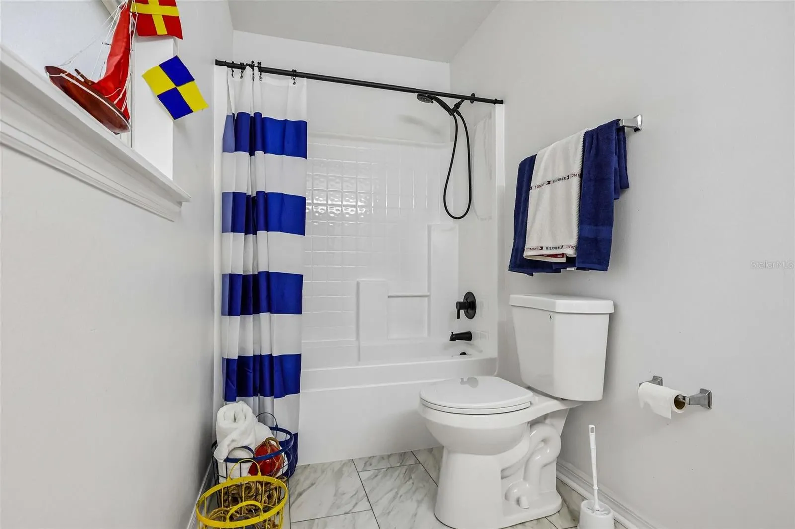 Upstairs guest bathroom is spacious -- great for sharing.