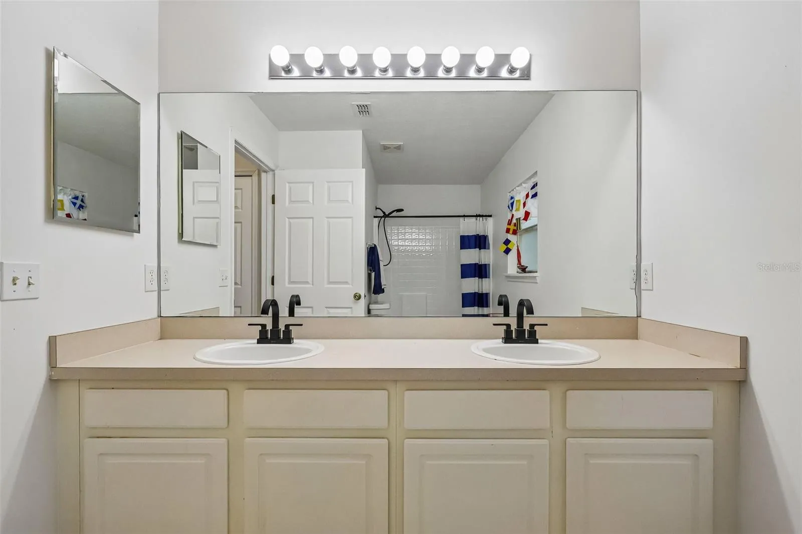 Upstairs guest bathroom is spacious -- great for sharing.