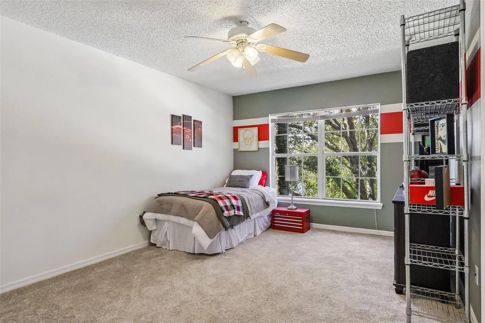 2 of 4 total bedrooms upstairs -- one at each corner of the house.