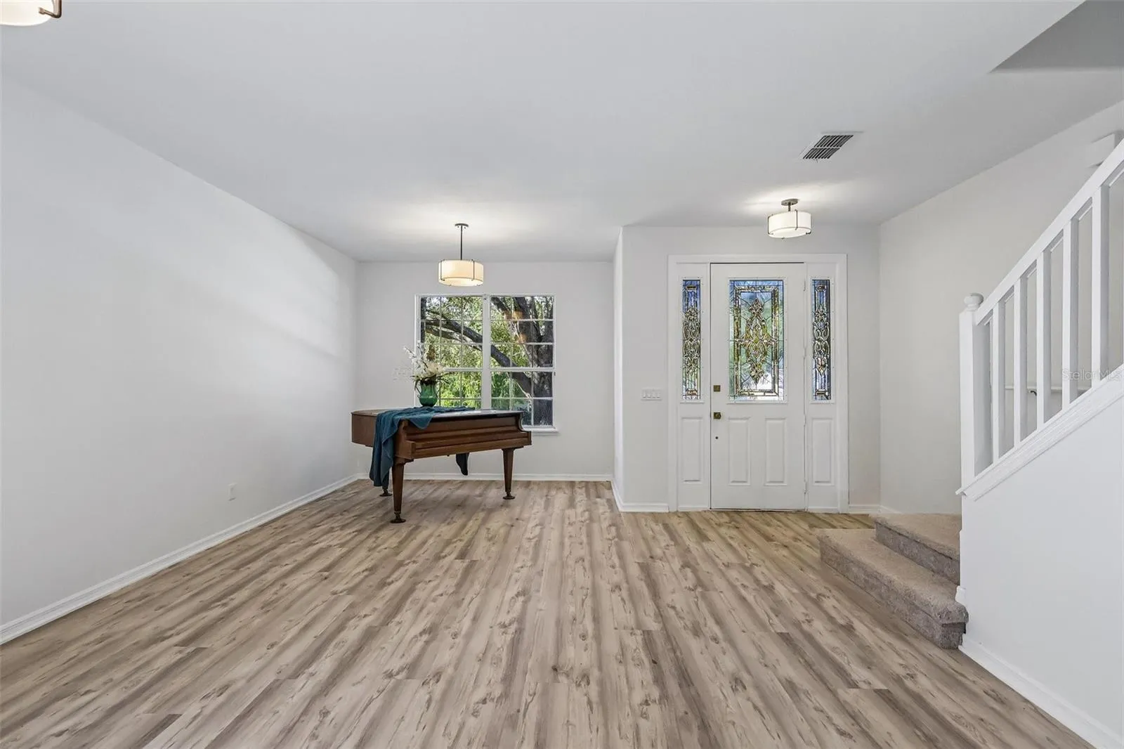 Large enough for a baby grand piano. Elegant!