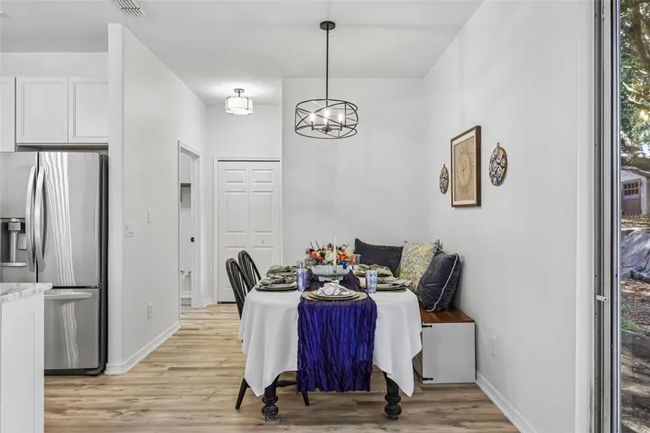 Dining room adjacent to the kitchen and backyard.