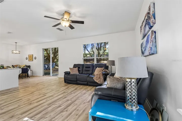 The family room facing the backyard and adjacent to the kitchen.