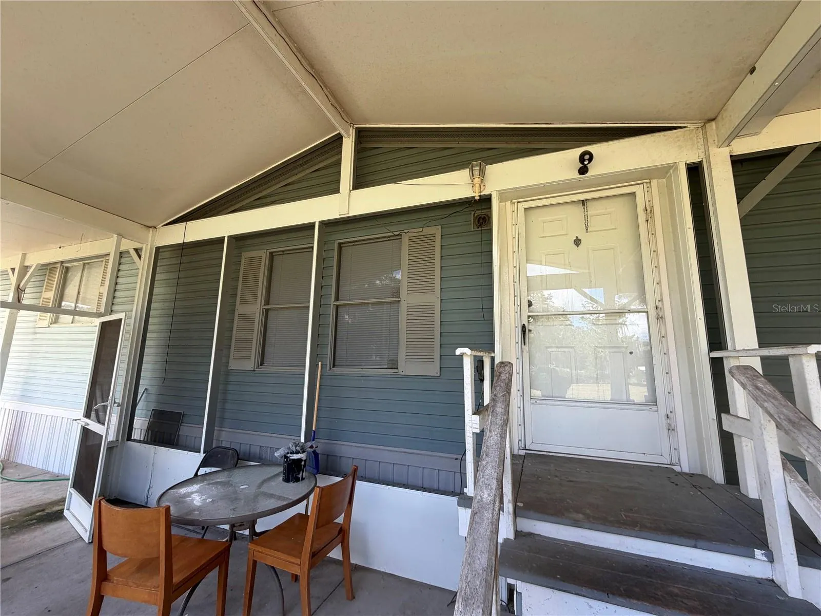 front screen porch perfect for morning coffees