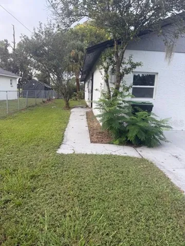Left side of the home.