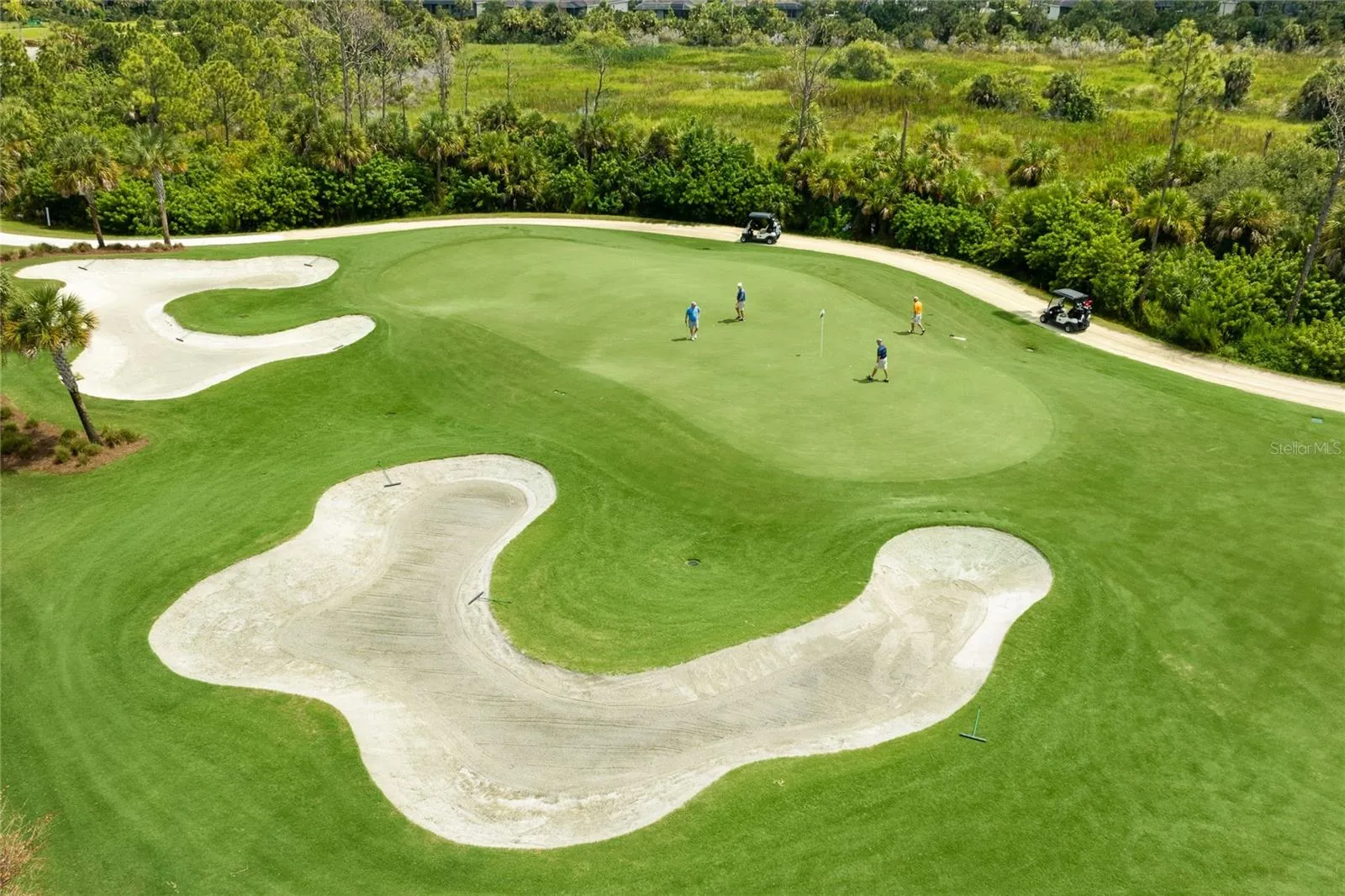18-hole Golf Course with beaututiful water and preserve views and lush landscaping.
