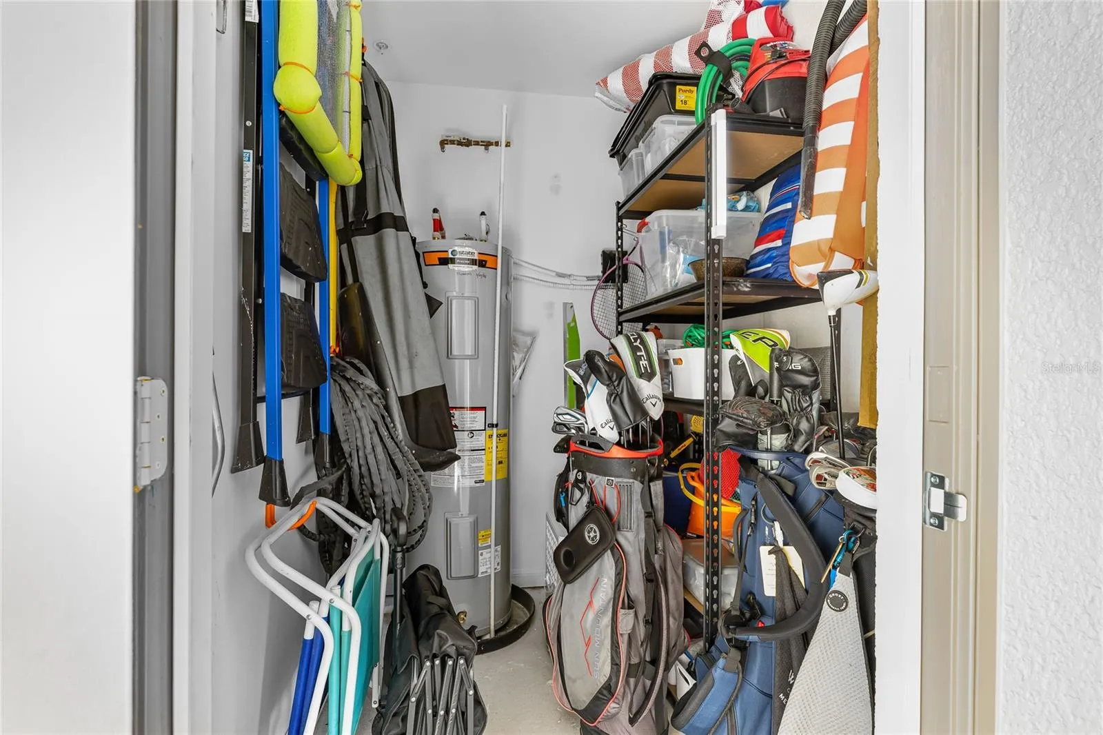 Additional storage closet offering convenient space for your storage needs.