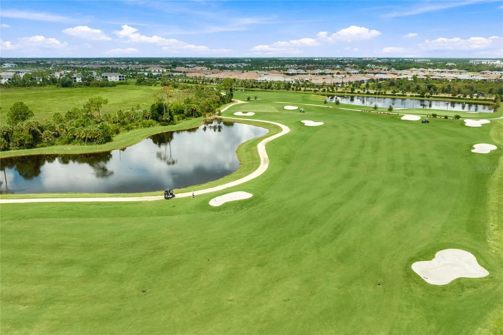 Thoughtfully designed Golf Course with several water-views and lush landscaping.