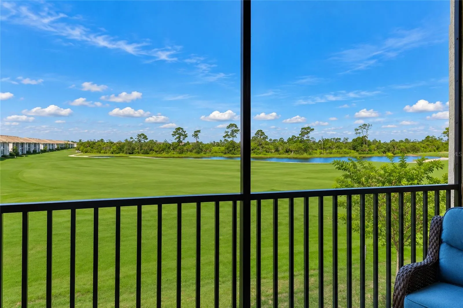 Screened and covered Lanai with Golf Course, Water and preserve views