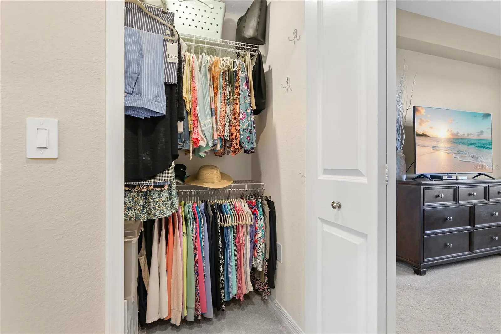 One of two Large walk-in closet's with additional shelving.