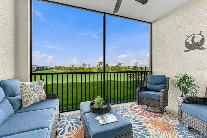 Screened and covered Lanai with Golf Course, Water and preserve views