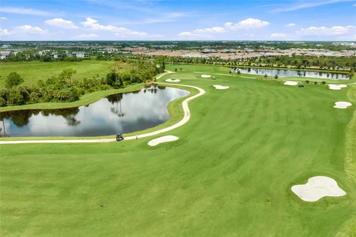 Thoughtfully designed Golf Course with several water-views and lush landscaping.