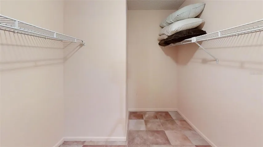 PRIMARY WALK IN CLOSET