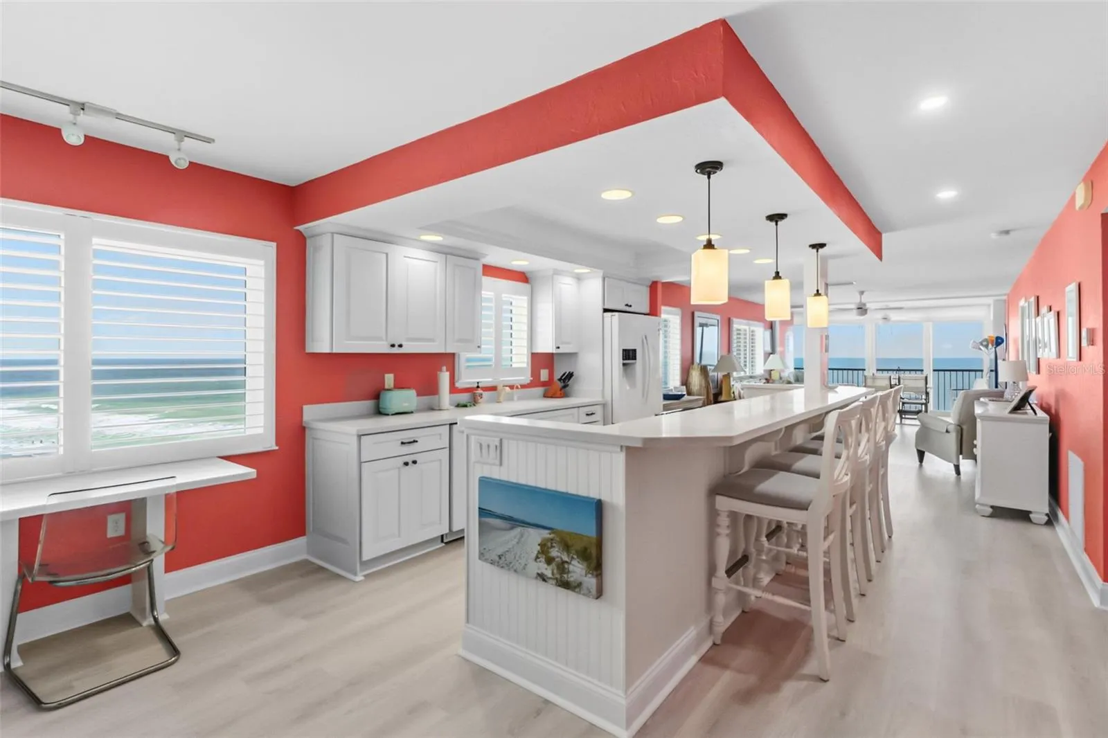 View as your enter the condo looking at kitchen, family room in the rear, and then your lanai.