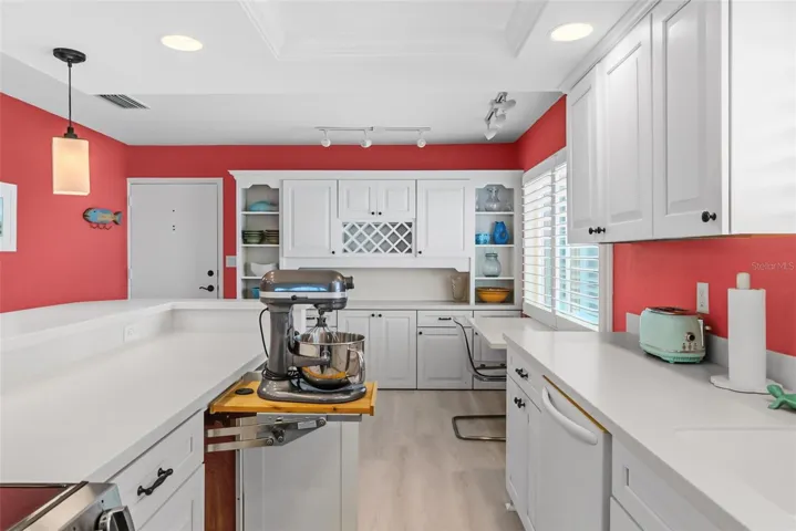 The kitchen also includes a cleaver cabinet for your professional mixer.