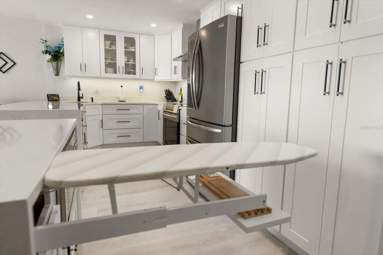 Built in Ironing Board that neatly tucks away.