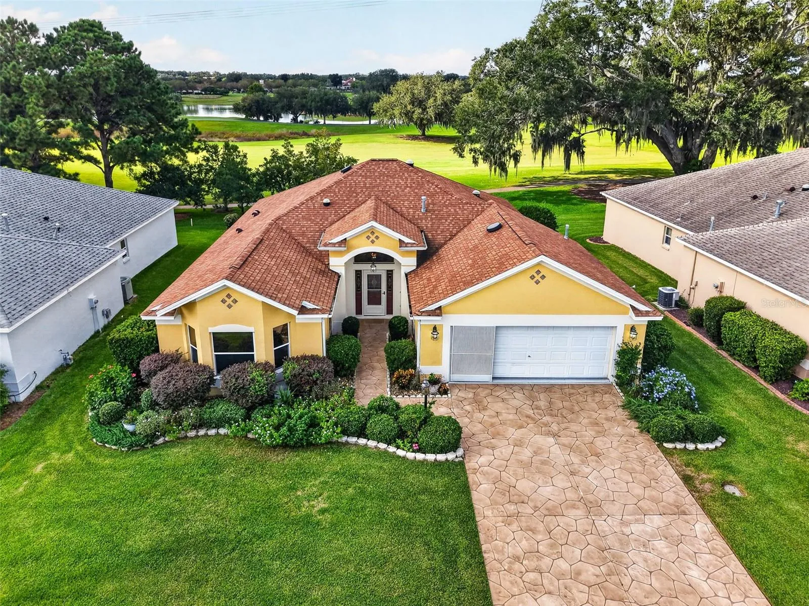 Aerial Front Elevation with GOLF and WATER VIEWS!
