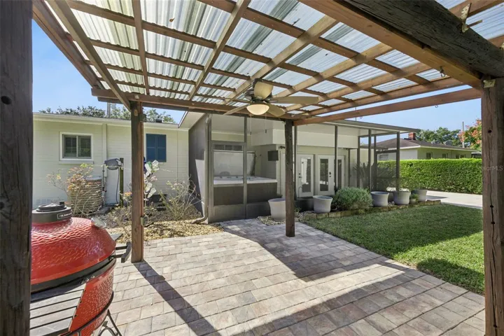 Sturdy Gazebo for all your grills!  Ceiling fan and power on a pole complete this area for your outdoor grilling needs