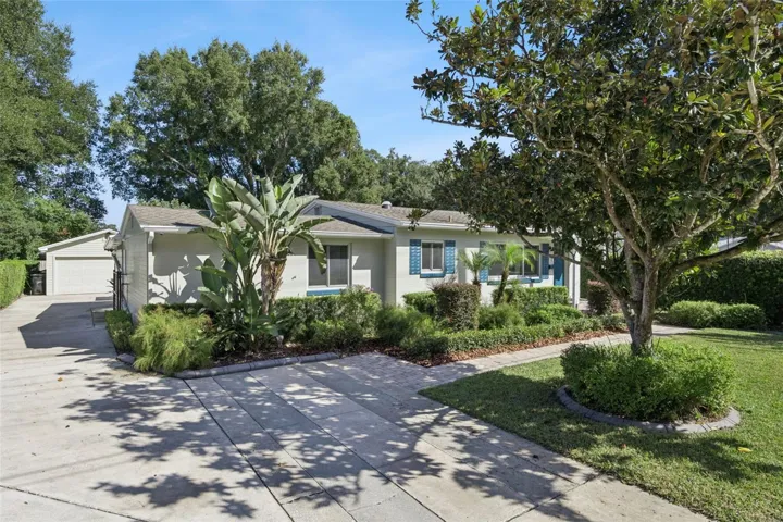Downtown with a extra long driveway to a 4 car tandem garage.