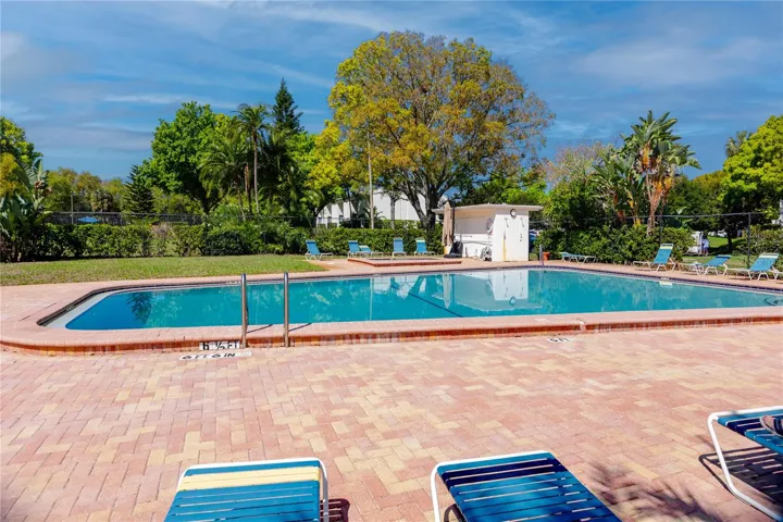 Large pool with paver deck.