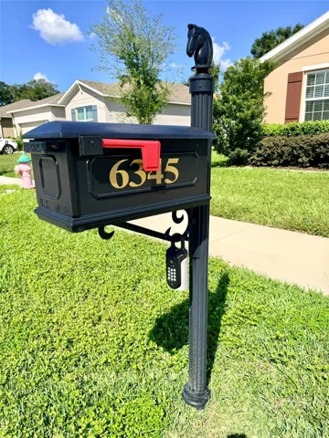 Lockbox on mailbox rail