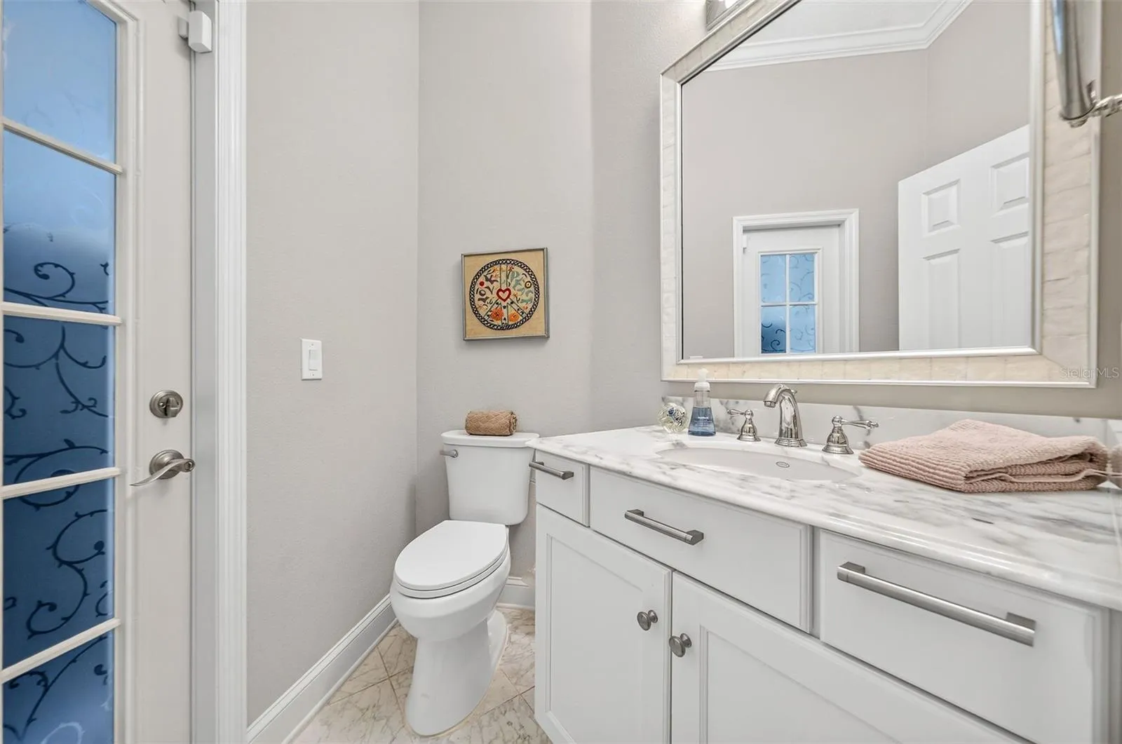 Half bath off of family room and rear porch