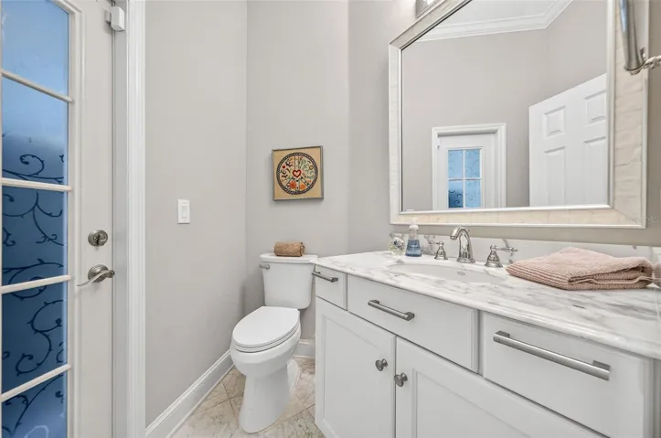 Half bath off of family room and rear porch