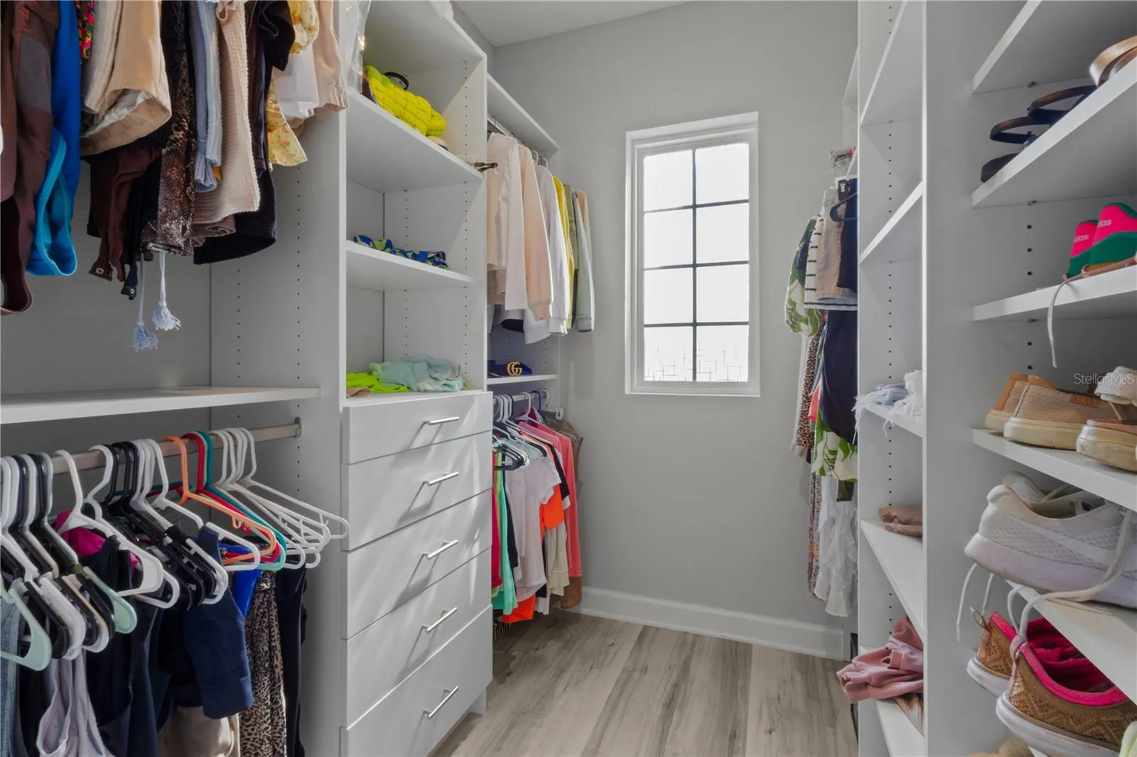 One of the 2 walk-in closets in the Primary bedroom