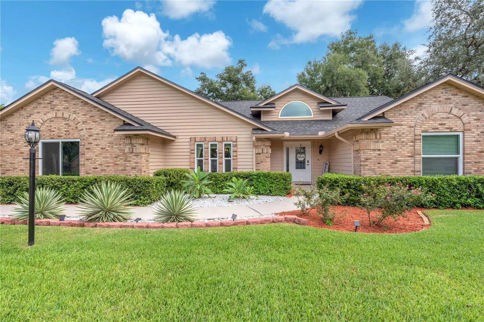 Welcome home to timeless elegance, classic charm and exceptional curb appeal.