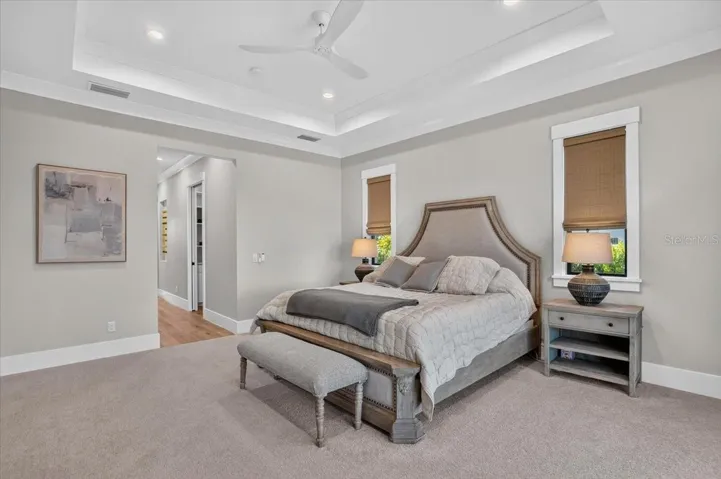 Double Tray Ceiling and Recessed Lighting.  Ceiling Fan connected to Control 4 home automation system.