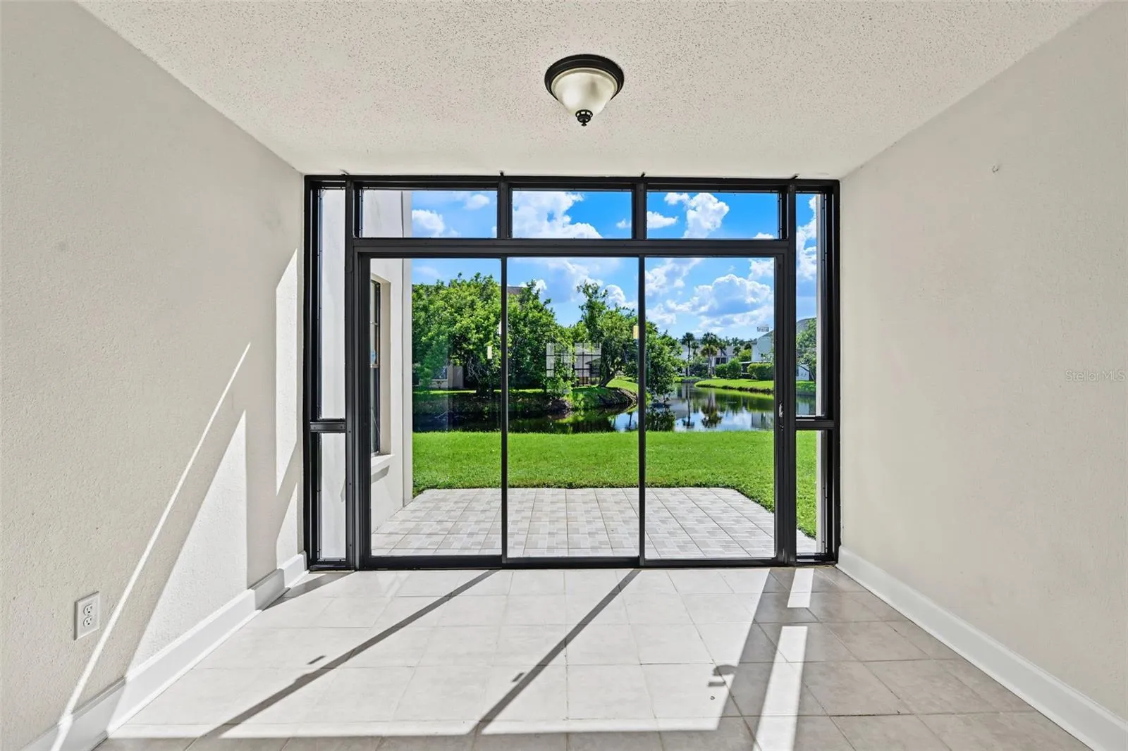 This area is rare and adds extra space that could be used as a sunroom, office, den, or studio.  It sits just off the Living Room and looks over the water.