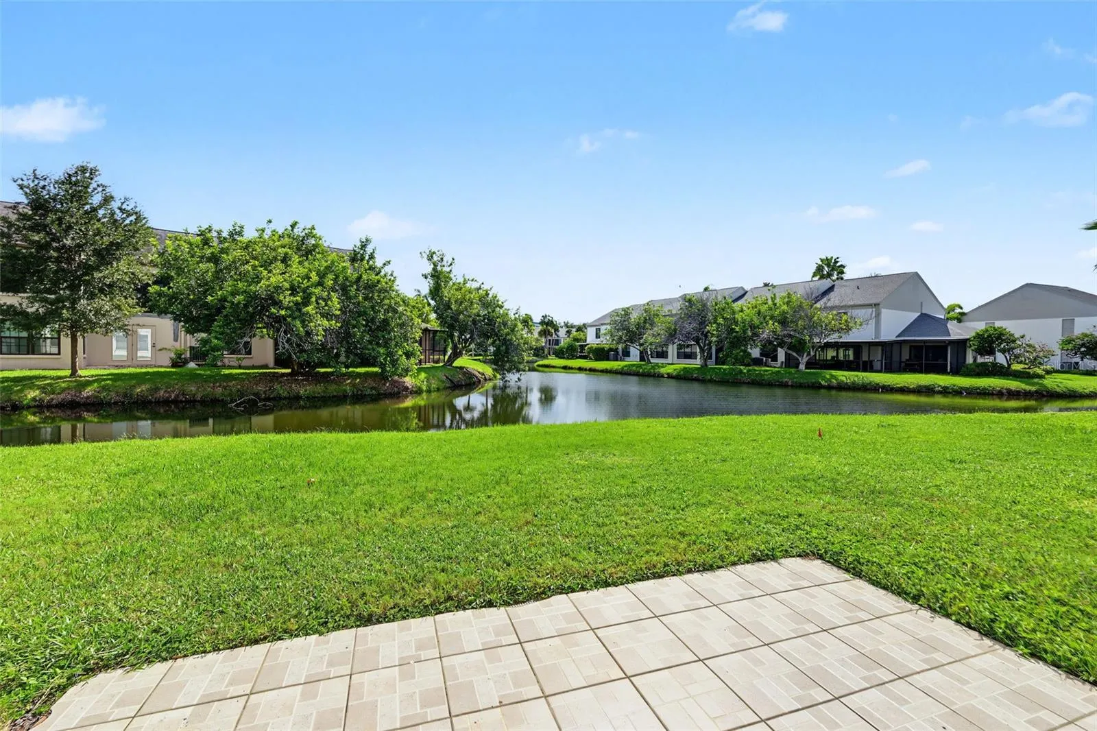 This 2 Bedroom, 2 Bath first floor condo has water views from the back sliders and both bedrooms providing natural light galore!