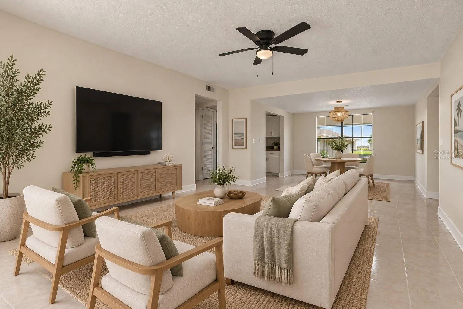 Virtually Staged - The Living Room is light, bright, and open with a lovely natural flow.